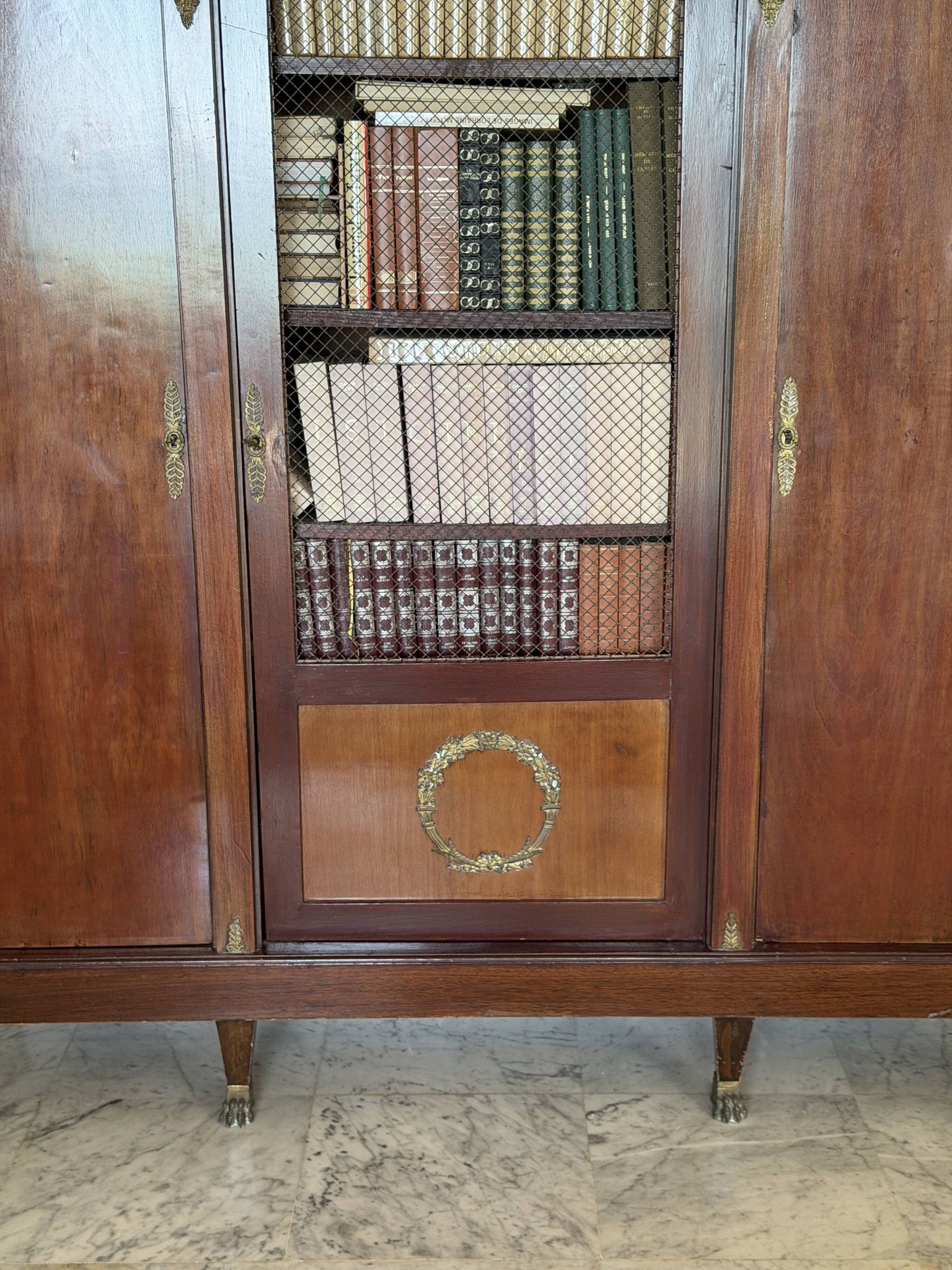 Large antique library from the Empire/Napoleon III period in mahogany and gilded bronze.