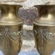 Pair of embossed brass bud vases stamped 17 cm