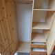 Wardrobe three doors, one with mirror, three drawers in solid pine wood