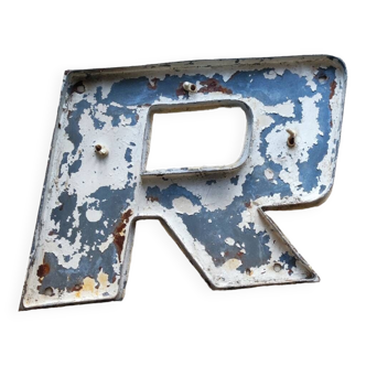 Old metal sign letter