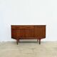 Teak Jentique sideboard — 1 door, 2 drawers & drop-down bar, England 1950s-60s