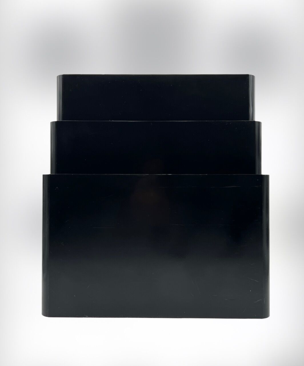Magazine holder by Giotto Stoppino for Kartell 1970