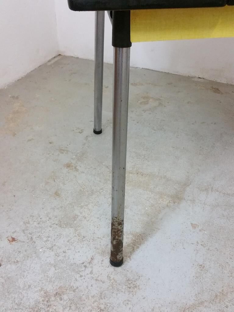 Table and chairs in formica yellow