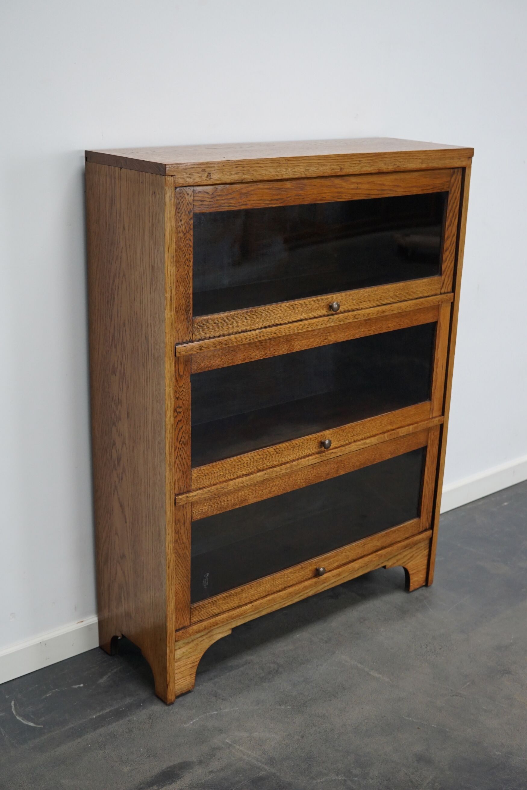 German Oak Bookcase with Folding Doors In Style of Globe Wernicke, ca 1930s