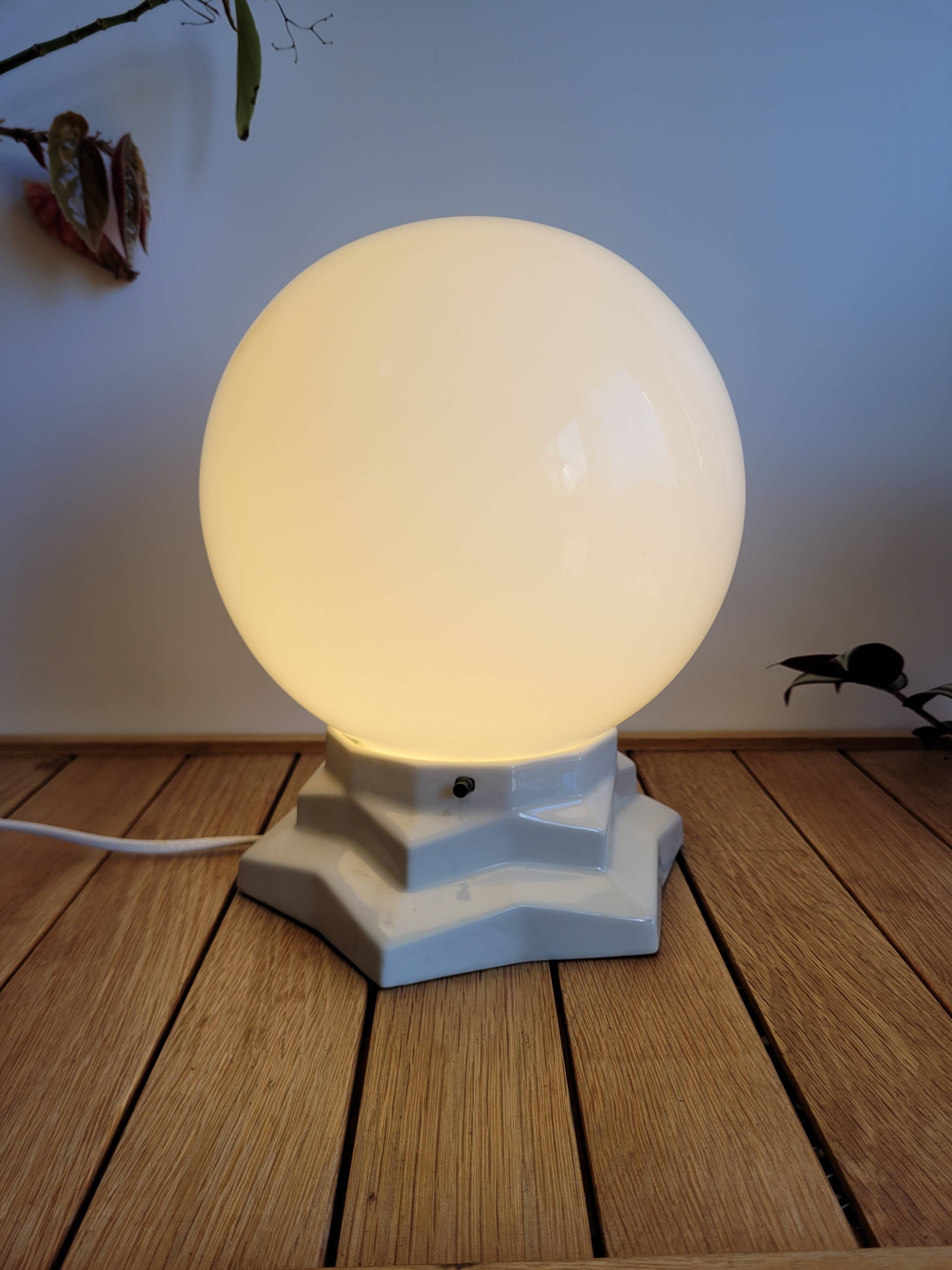 Vintage globe and ceramic table lamp