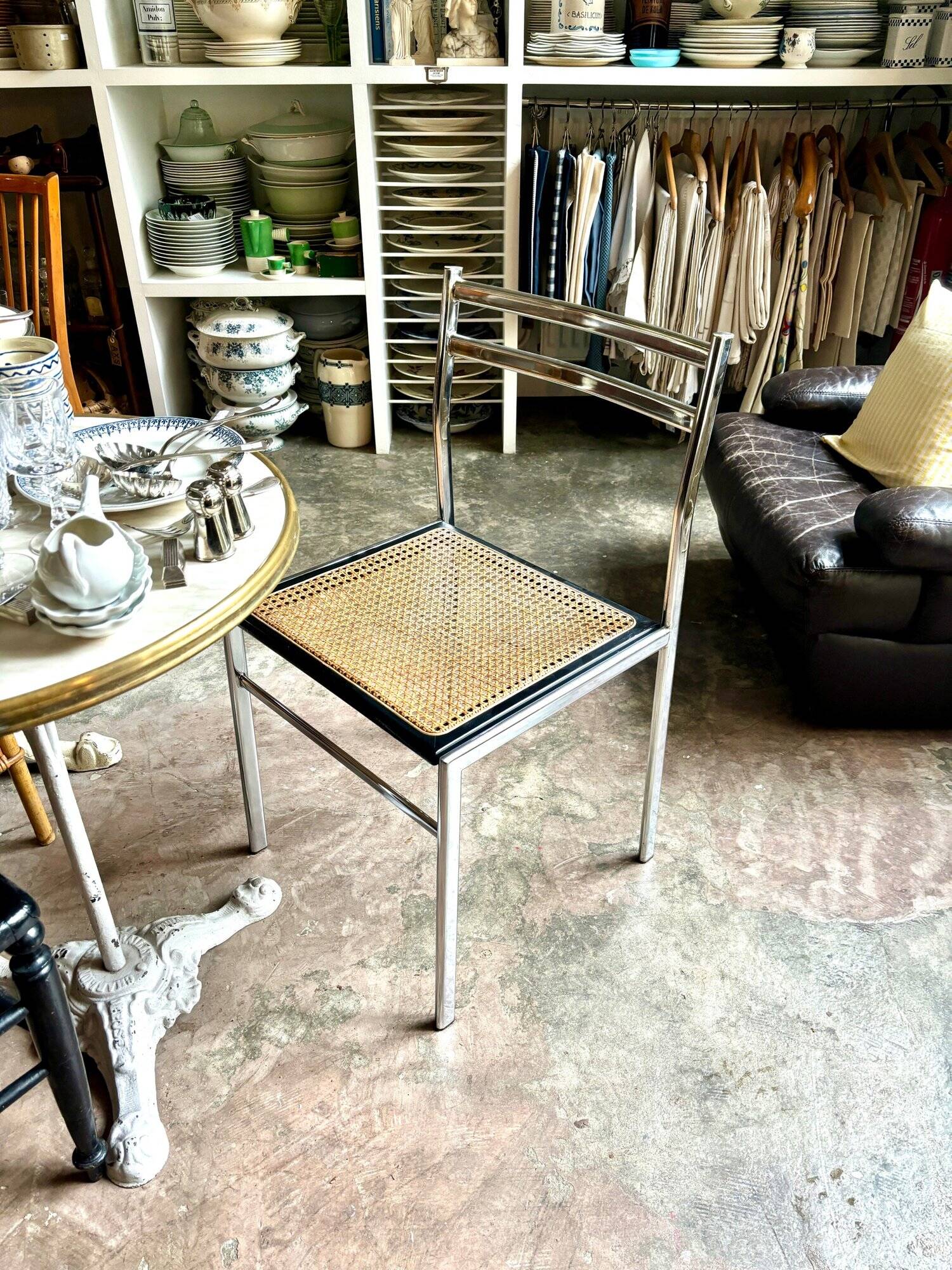 Chair in chrome metal, black wood and canework
