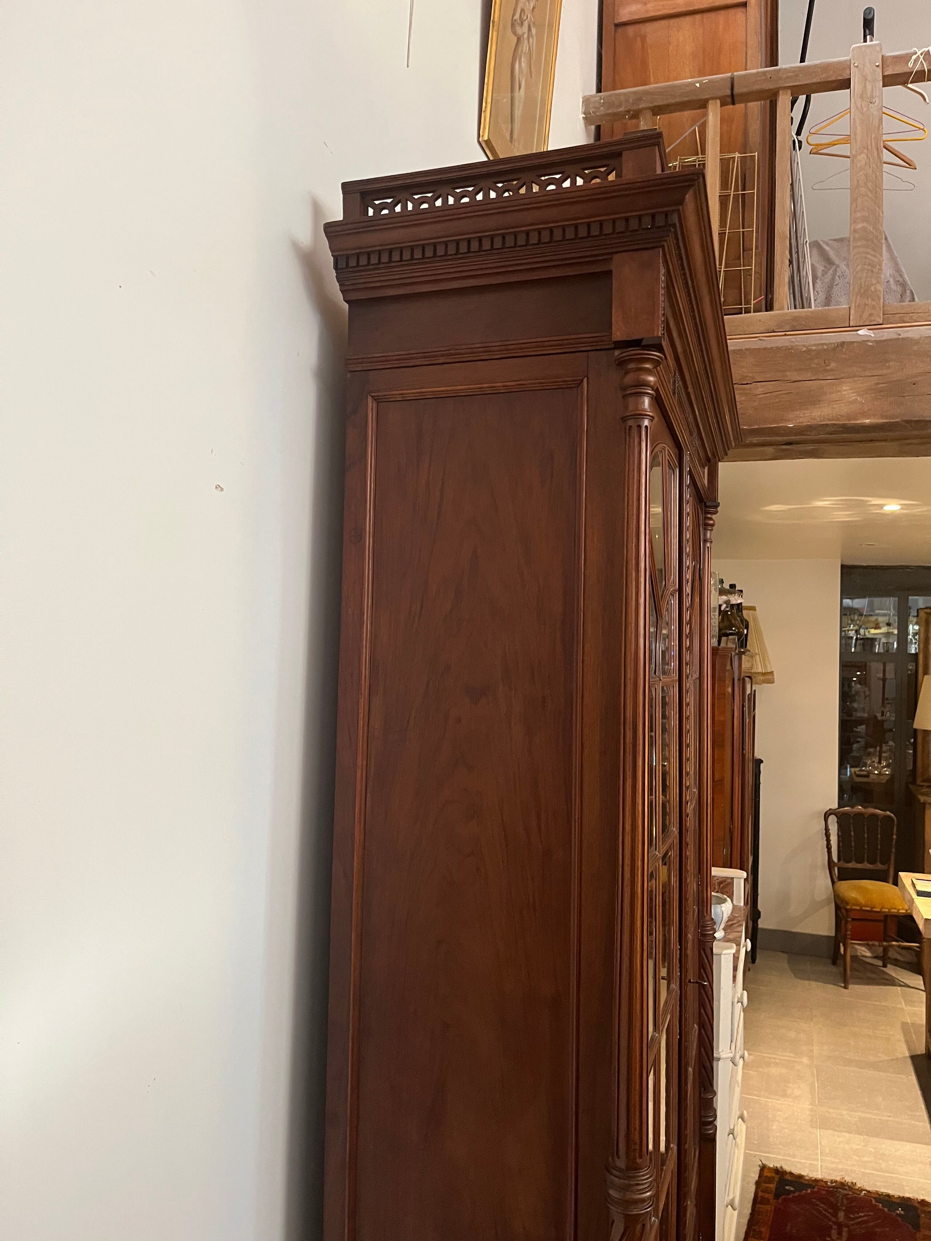 Louis XVI style beveled glass bookcase