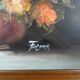 Vintage decorative table featuring a floral still life, signed Frederik.