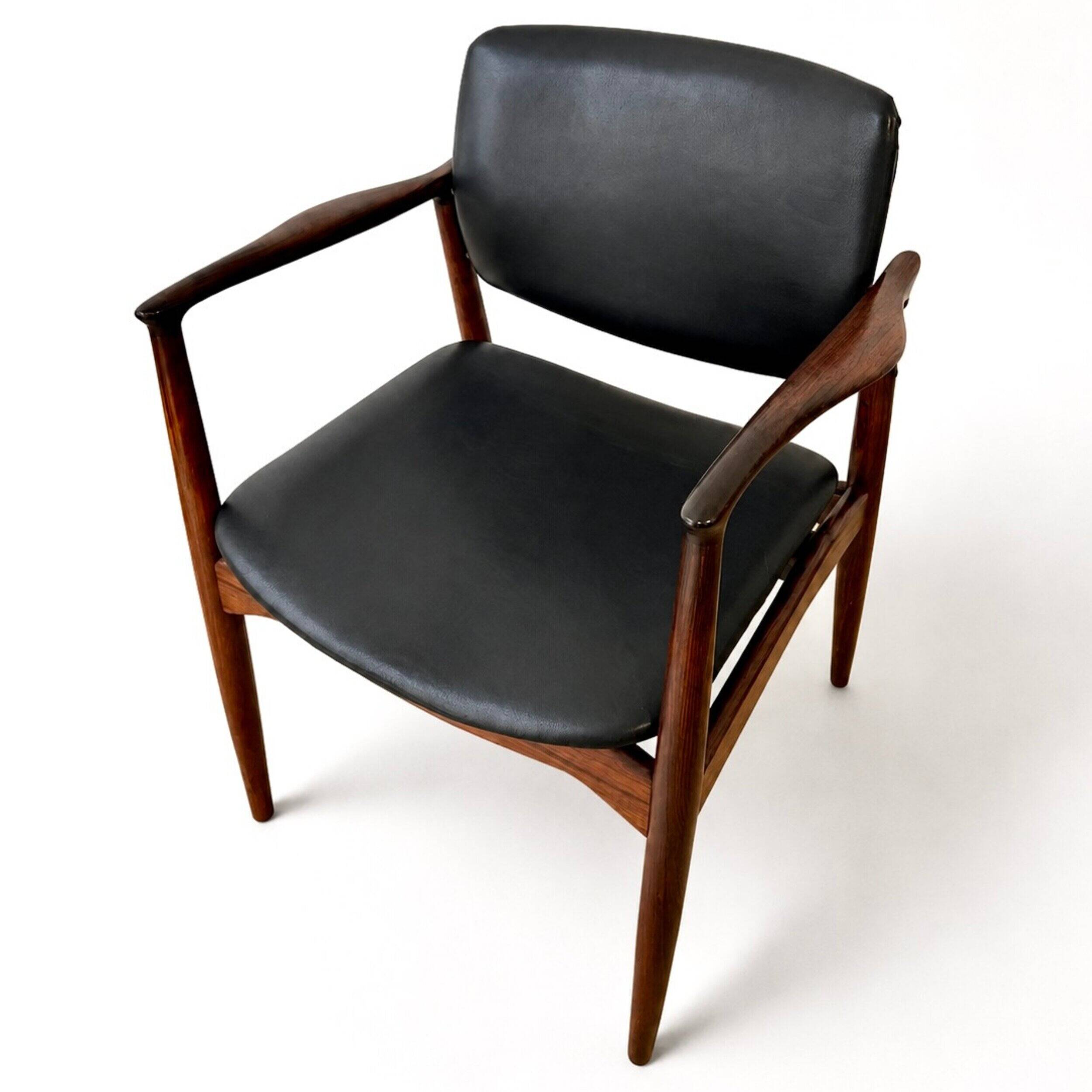 Captain armchair in rosewood by Erik Buch
