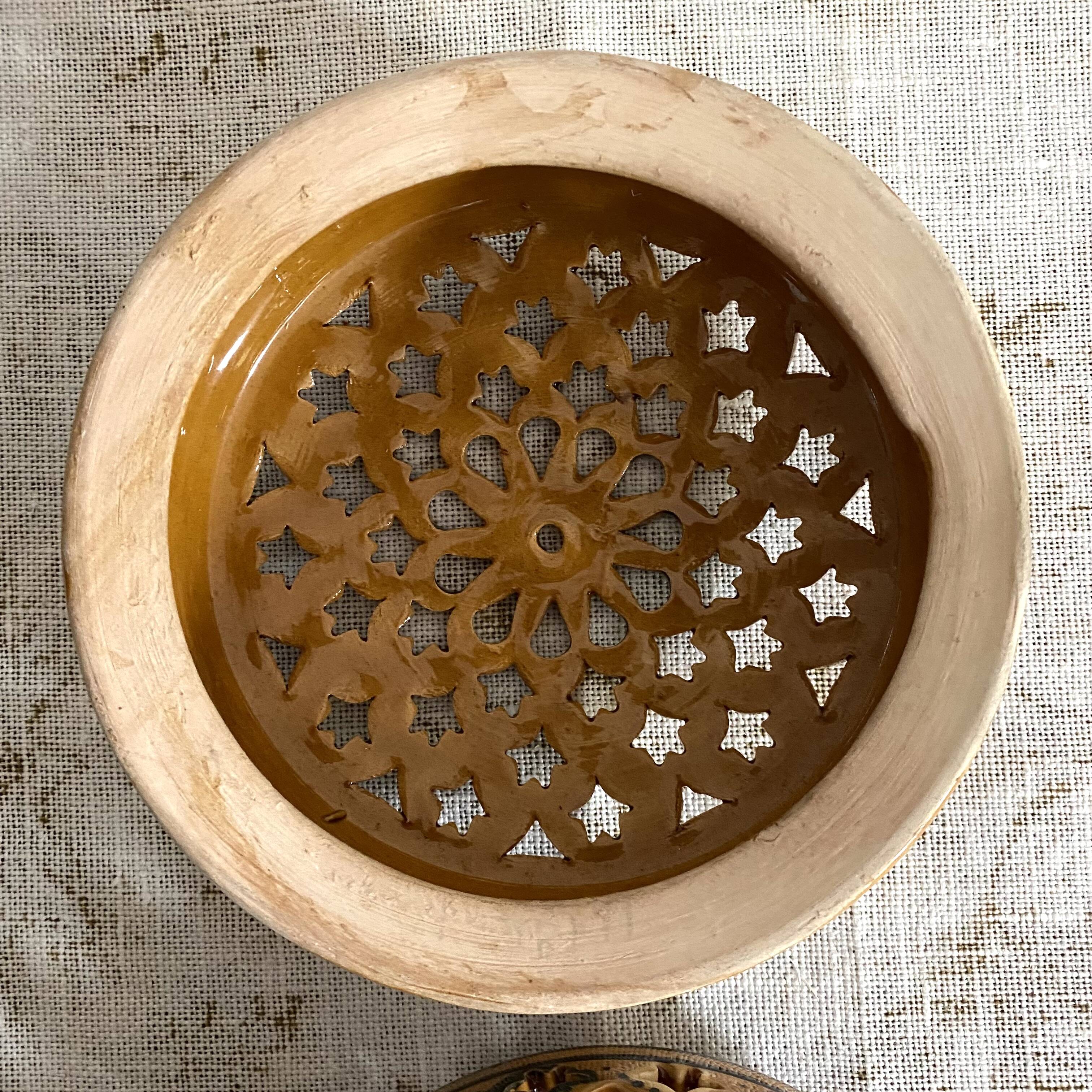 Pair of enamelled terracotta wall lights