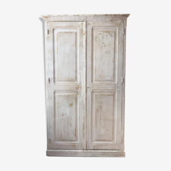 Antique wardrobe in patinated pine
