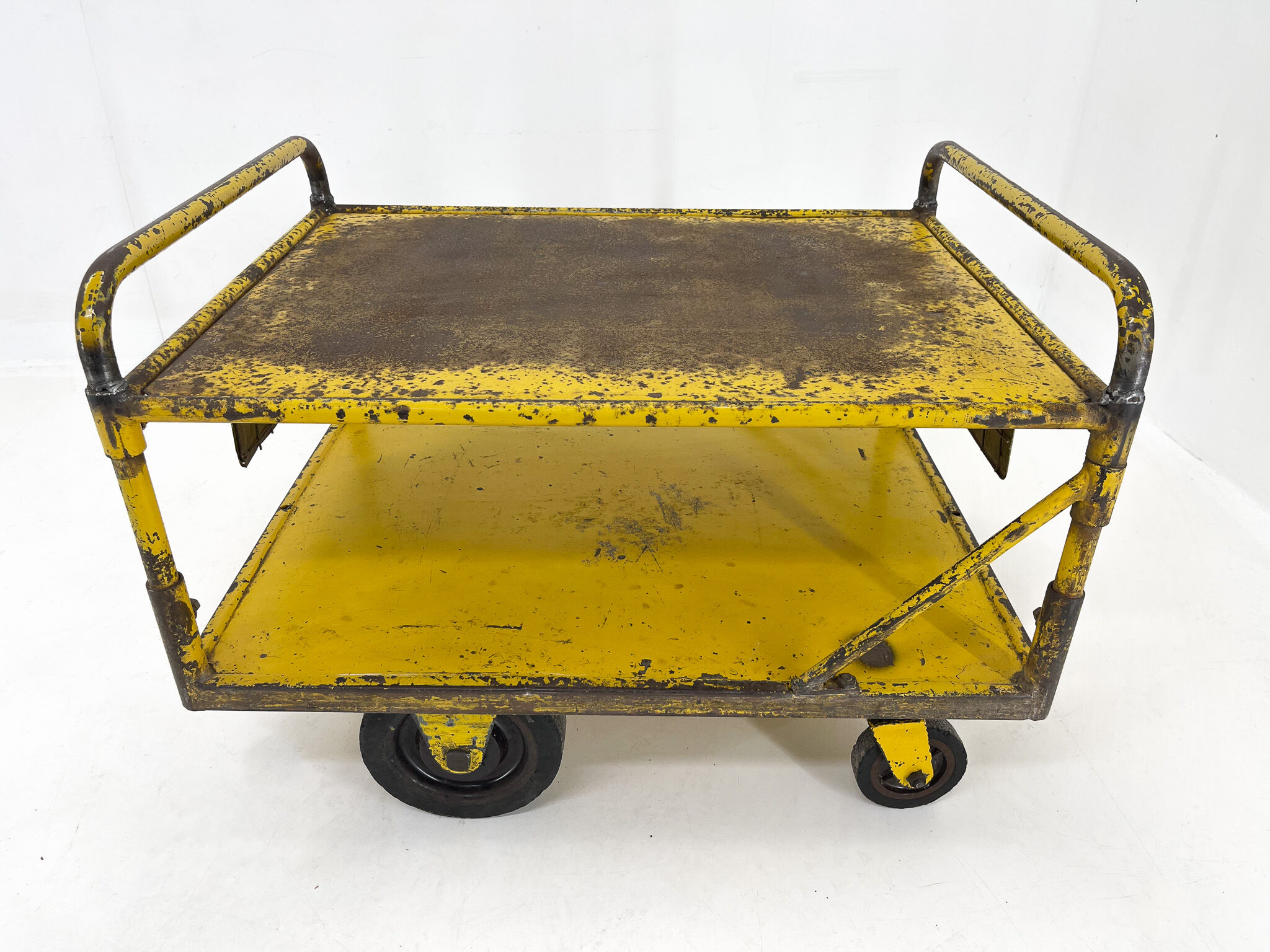 Vintage industrial coffee or side table on wheels