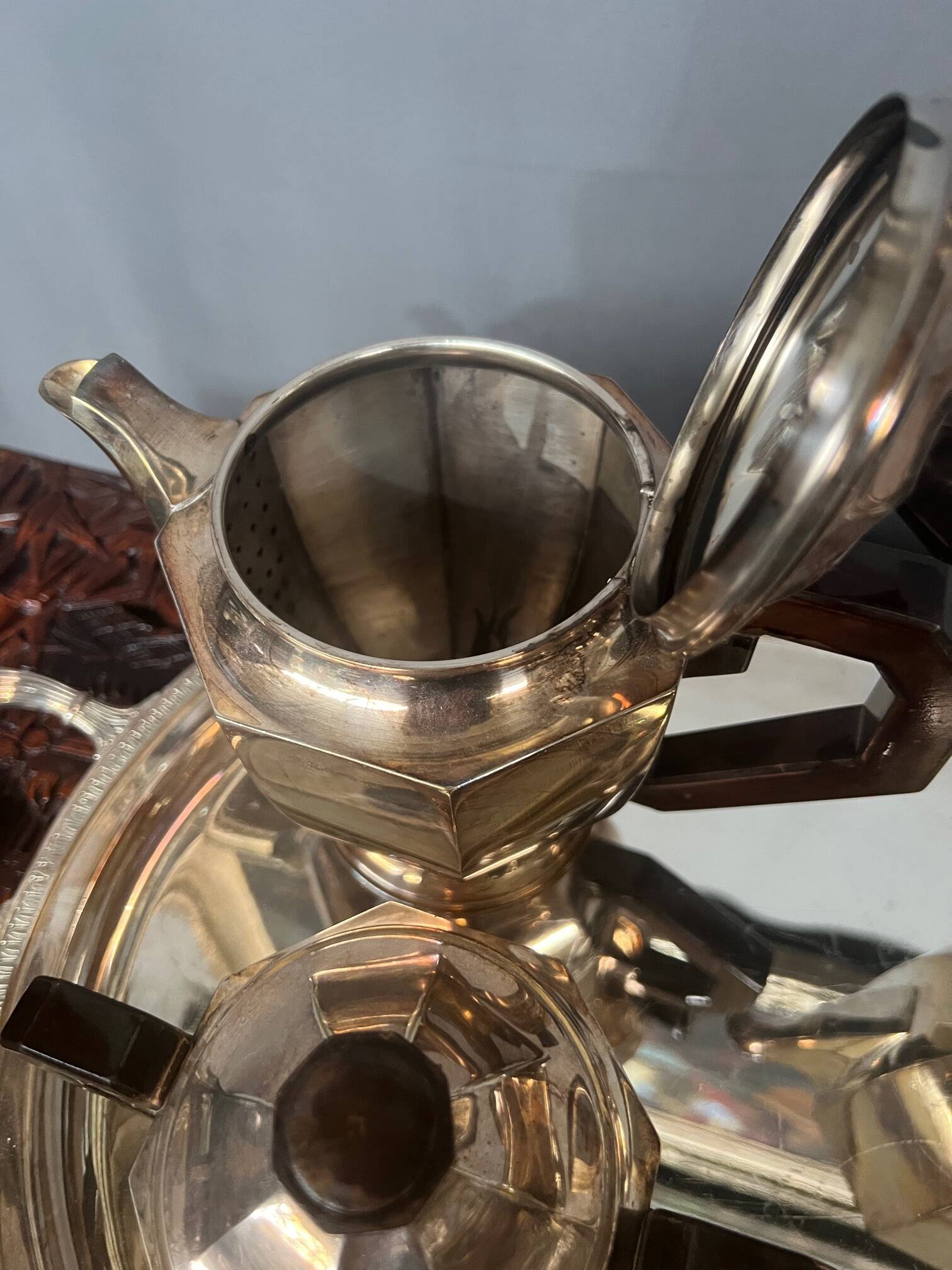 Art Deco tea and coffee service. Silver-plated metal and mahogany.