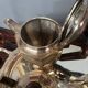 Art Deco tea and coffee service. Silver-plated metal and mahogany.