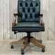 English chesterfield office armchair in green leather from the 1980s