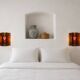 Brutalist wall sconces by Accolay in copper and resin, 1960s.