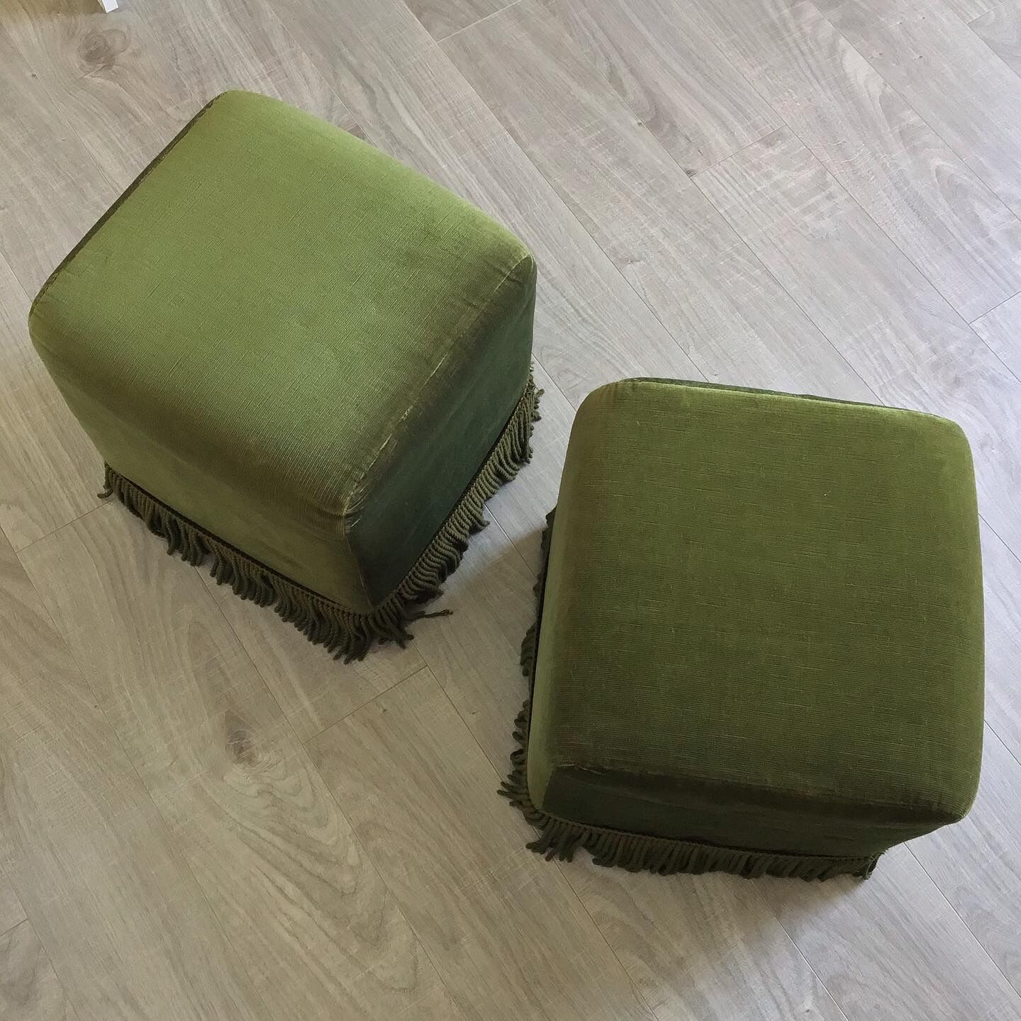 Pair of khaki green velvet beanbags
