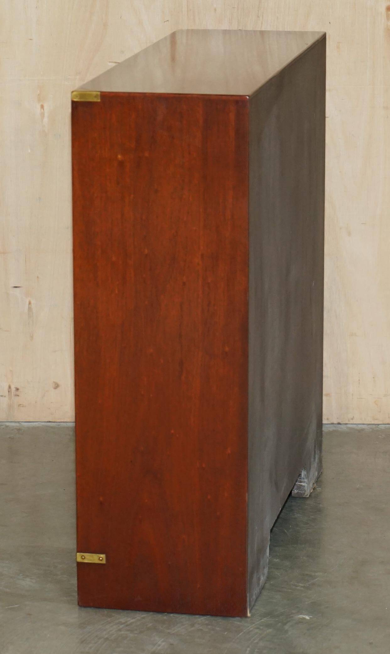 Low library campaign in solid mahogany by REH Kennedy