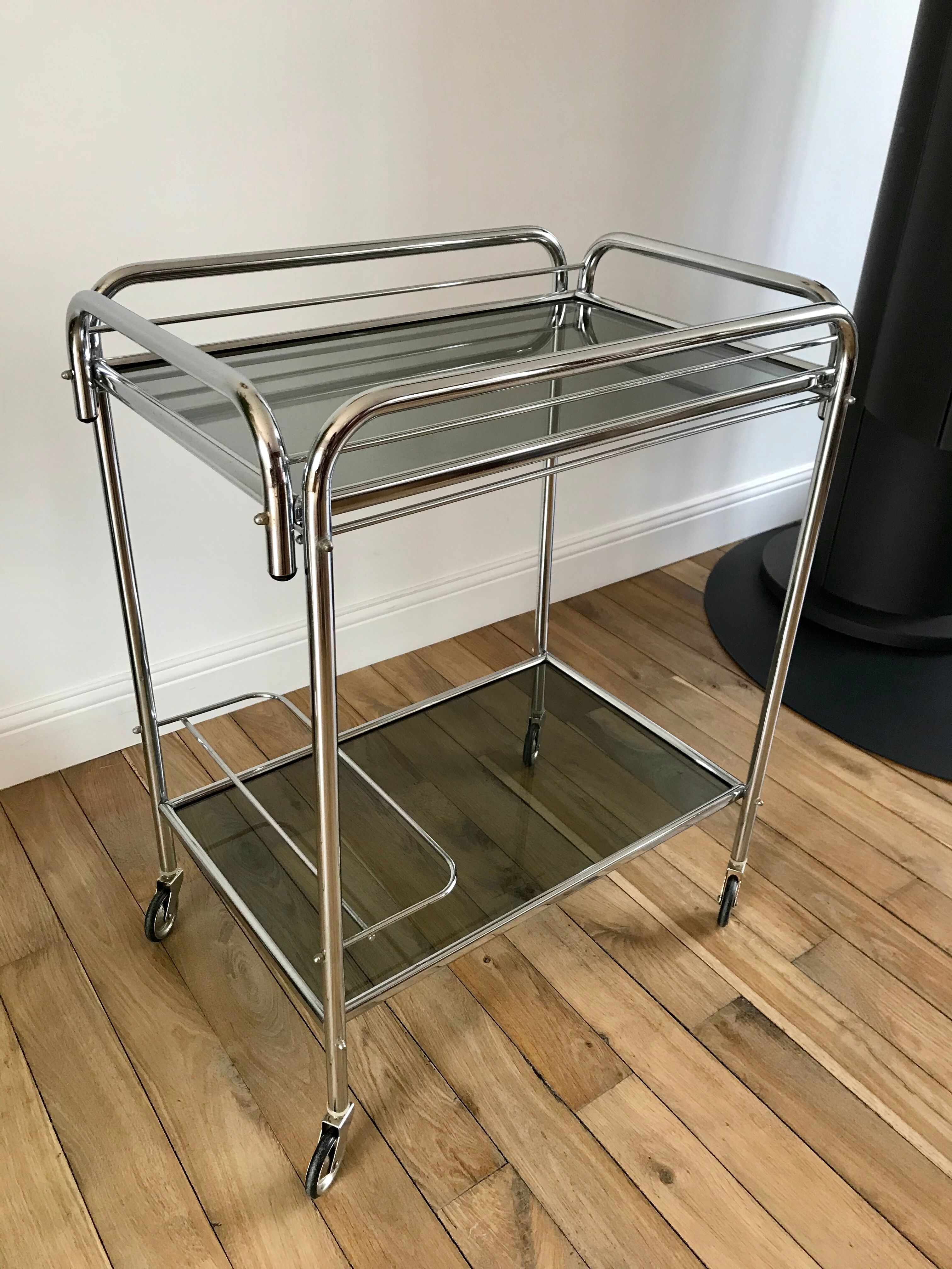 Serving in chrome steel and smoked glass 70s