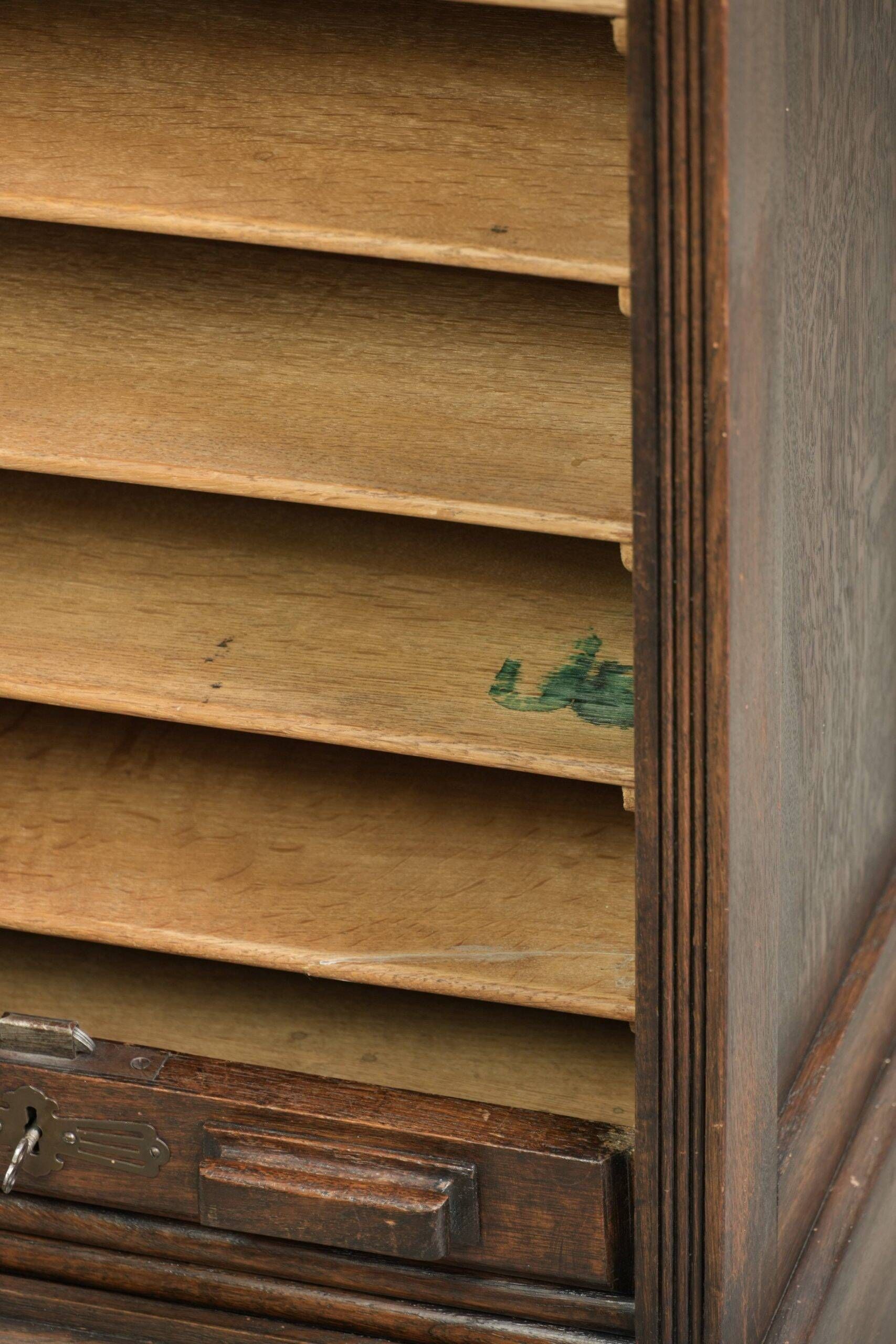 English antique archive cabinet with oak roll-up door from the 20th century