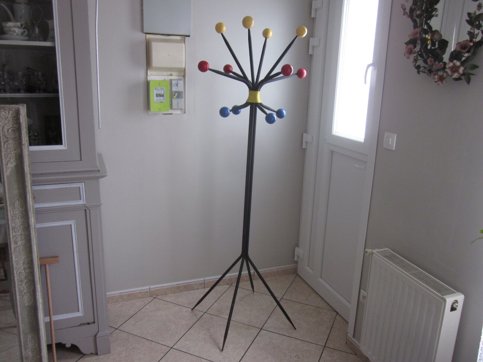 Vintage coat holder has 12 balls