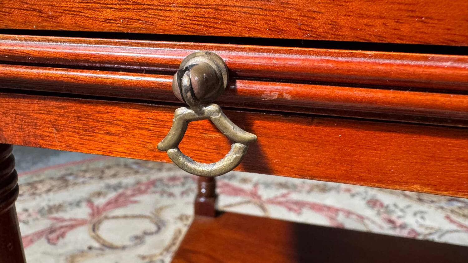 Antique mahogany rolling trolley