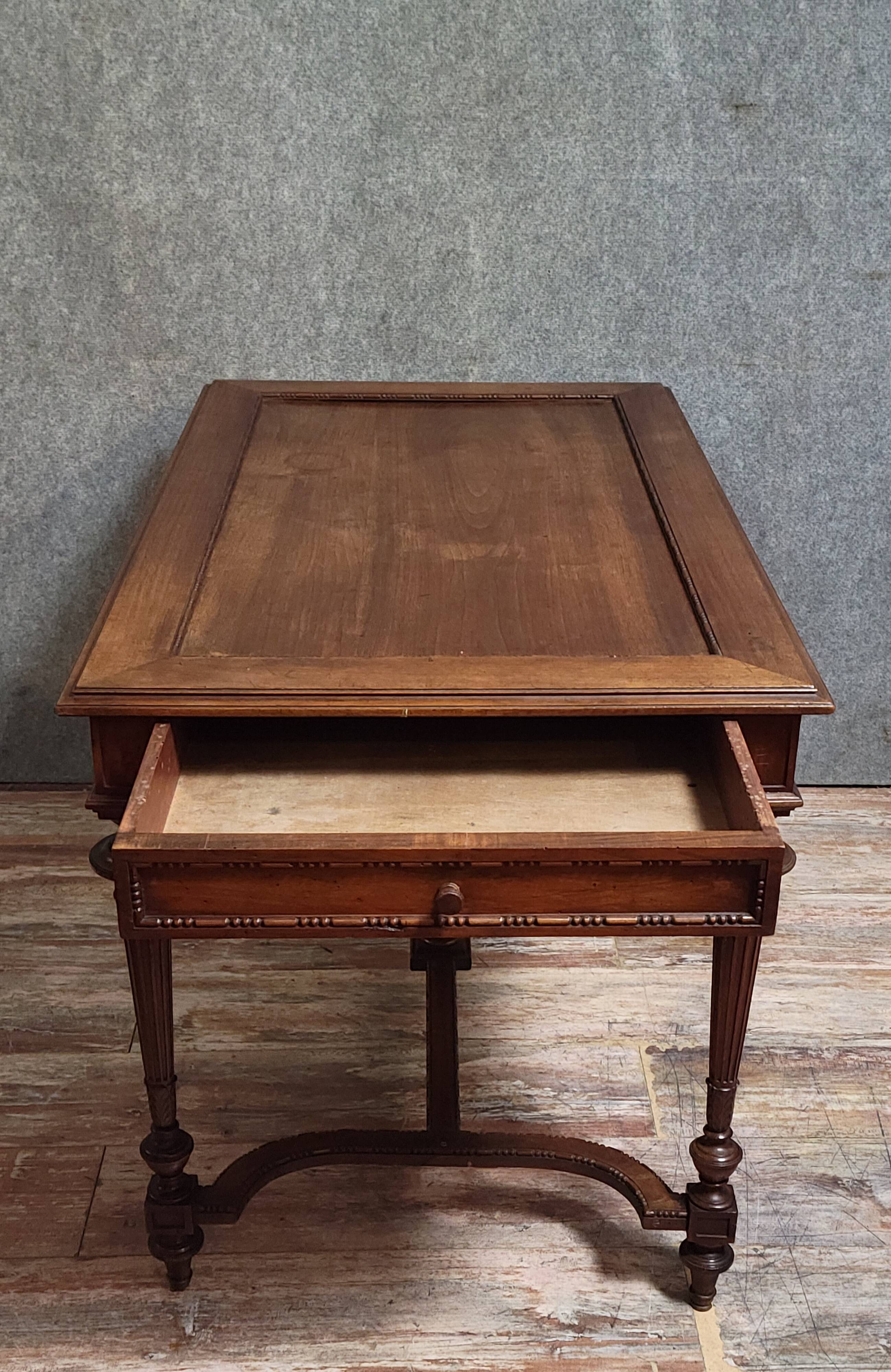 Louis XVI style desk with a curved top, in mahogany.