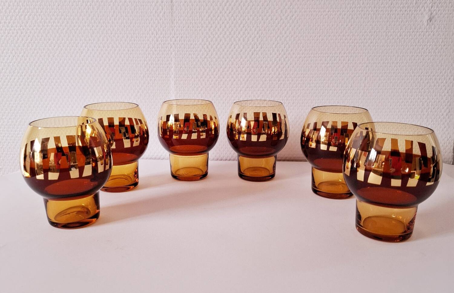 Carafe and its amber/golden glasses from the 70s.