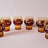Carafe and its amber/gold glasses from the 70s