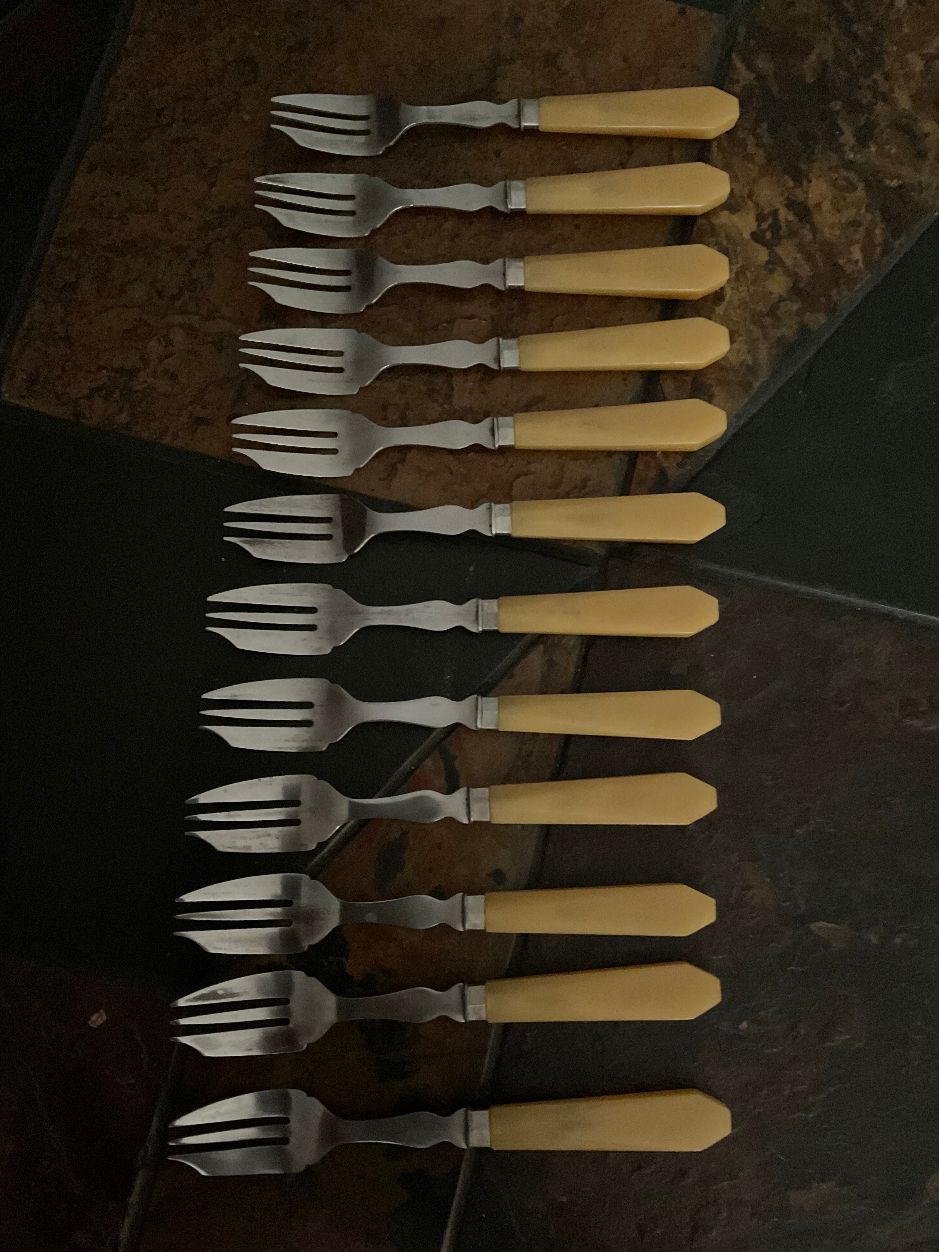 12 .vintage dessert forks