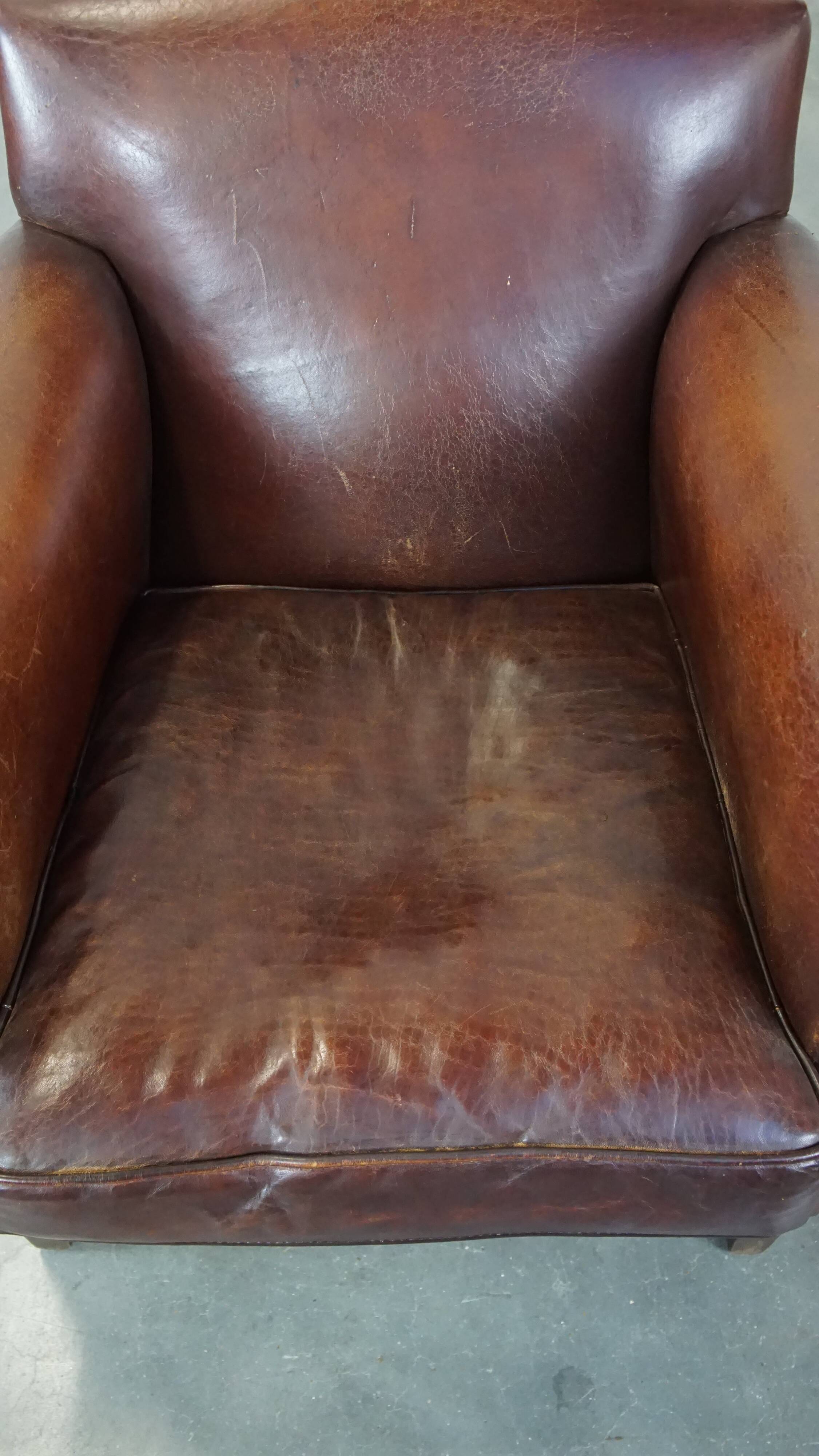 Design armchair made of sheep leather with a clean finish