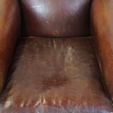 Design armchair made of sheep leather with a clean finish