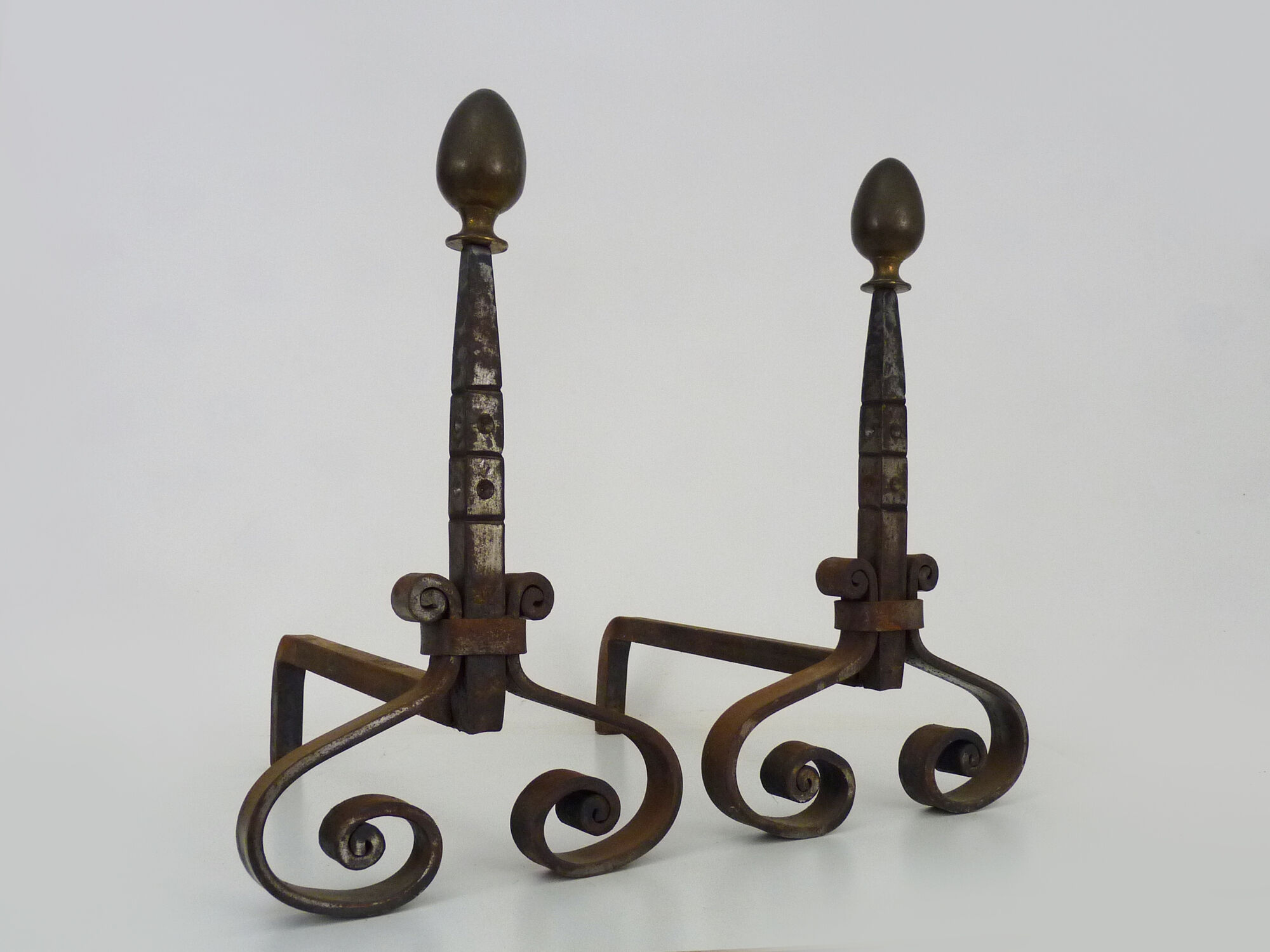 Pair of cast iron, wrought iron and brass chimney chenets. france 19th century