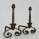 Pair of cast iron, wrought iron and brass chimney chenets. france 19th century