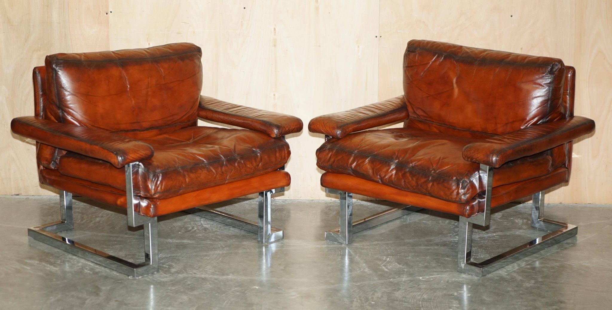 Restored suite Tim Bates for Pieff Mandarin leather chrome hardwood.