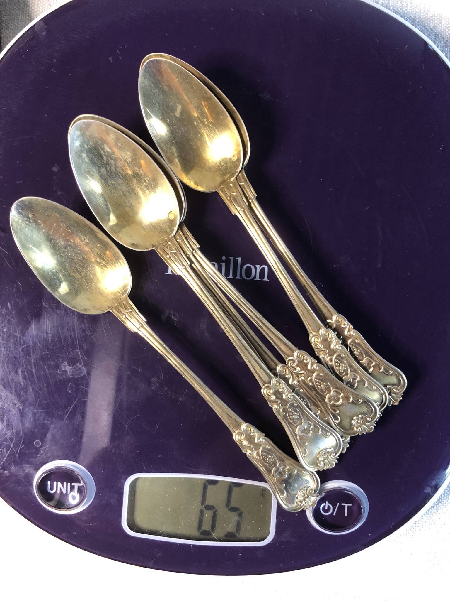 Vermeil (gilded silver) spoons in black wooden box