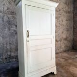 Antique French pine wardrobe with original white paint, circa 1900–1920.
