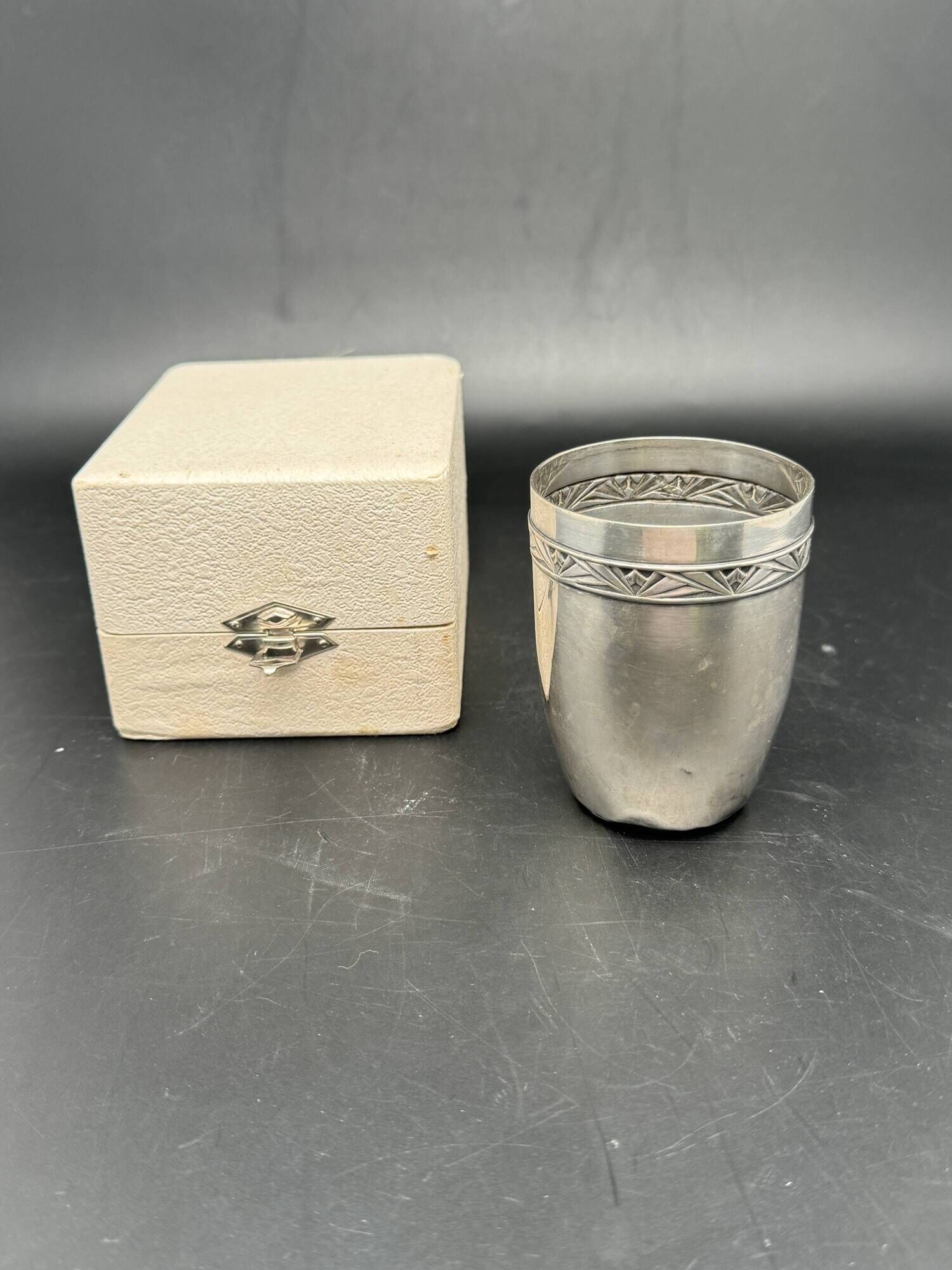 White metal (silverware) cup in its original box