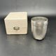 White metal (silverware) cup in its original box