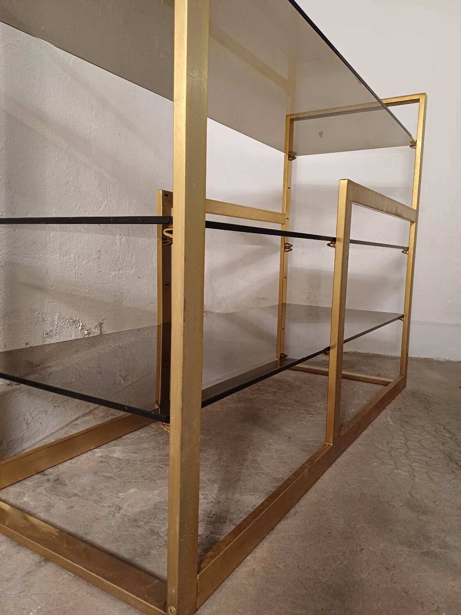 Brass shelf, smoked glass