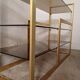 Brass shelf, smoked glass