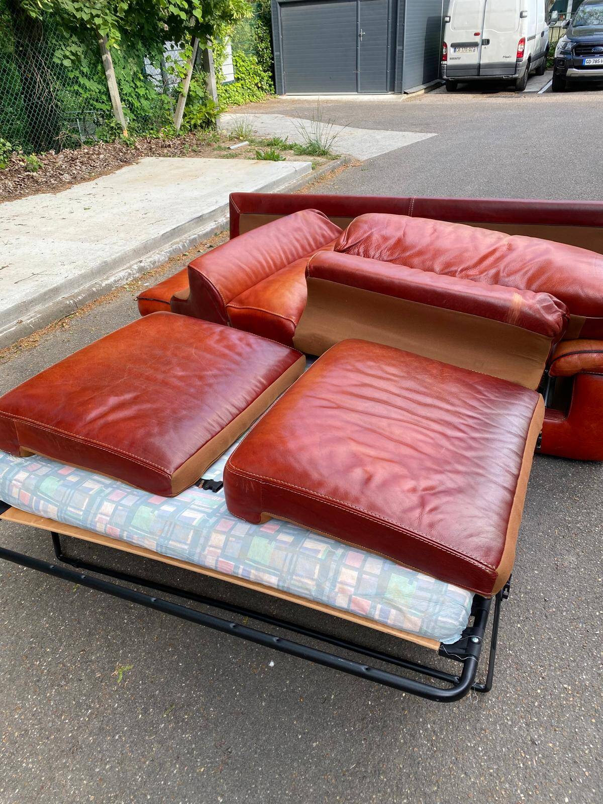 3-seater burgundy leather sofa convertible into a 2-seater bed 1940