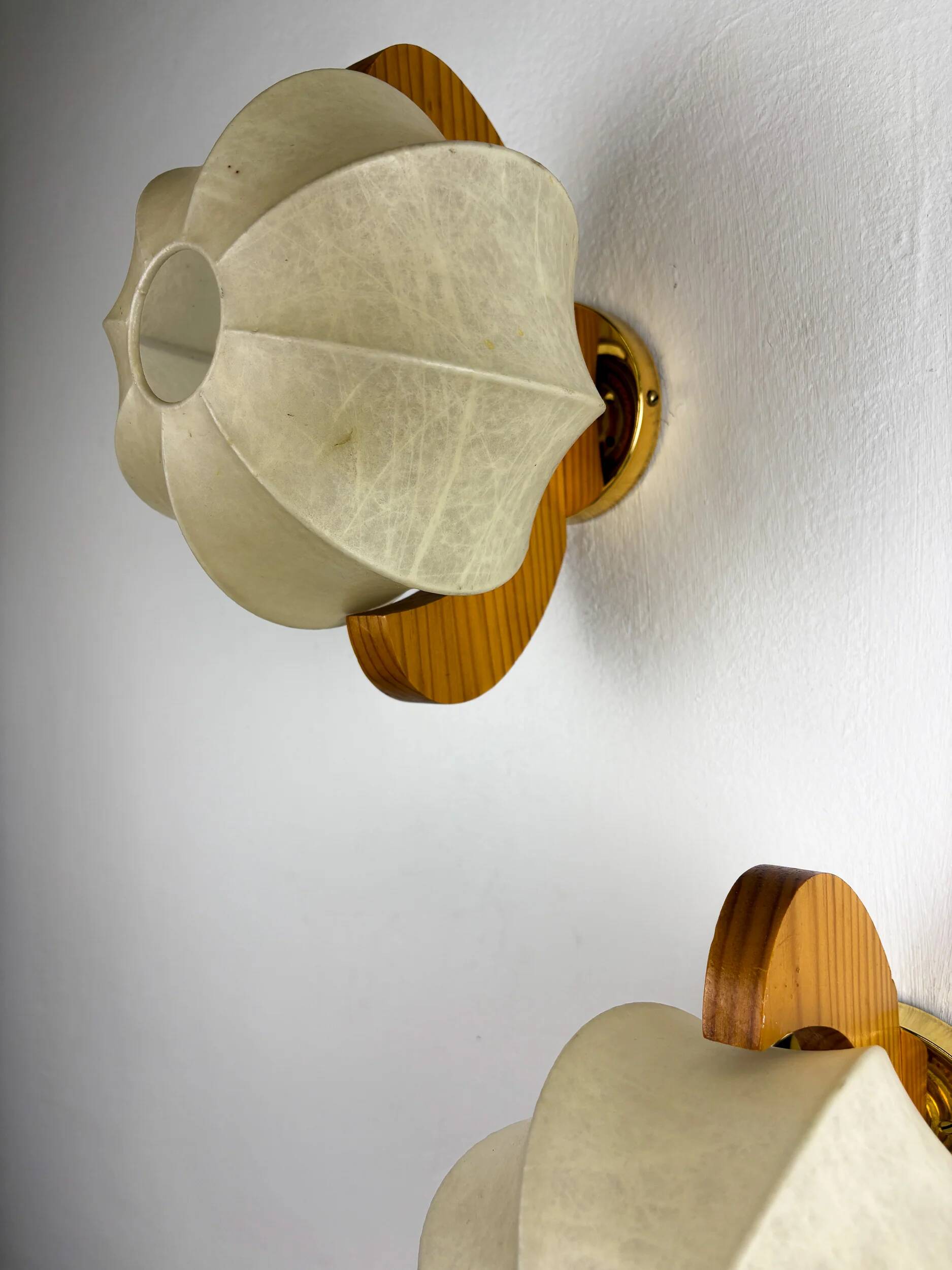 Pair of cocoon sconces with pine, Italy, 1970