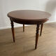 Round table in cherry wood - classic and timeless style