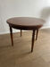 Round table in cherry wood - classic and timeless style