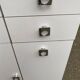 White bathroom storage cabinet from the 80s