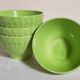 Four vintage spring green earthenware bowls