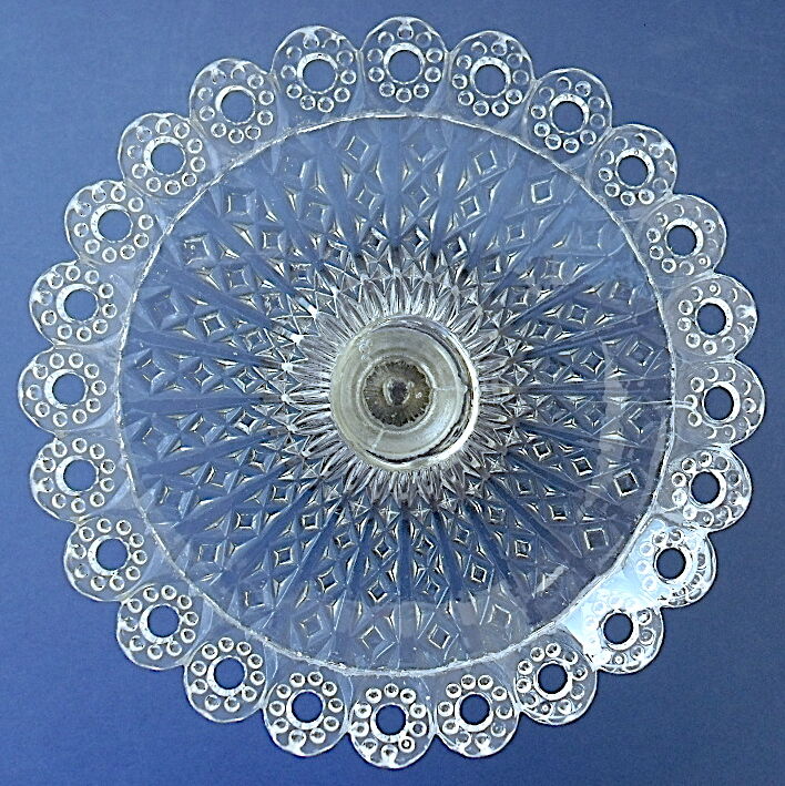 Plate mounted on pressed-molded glass column