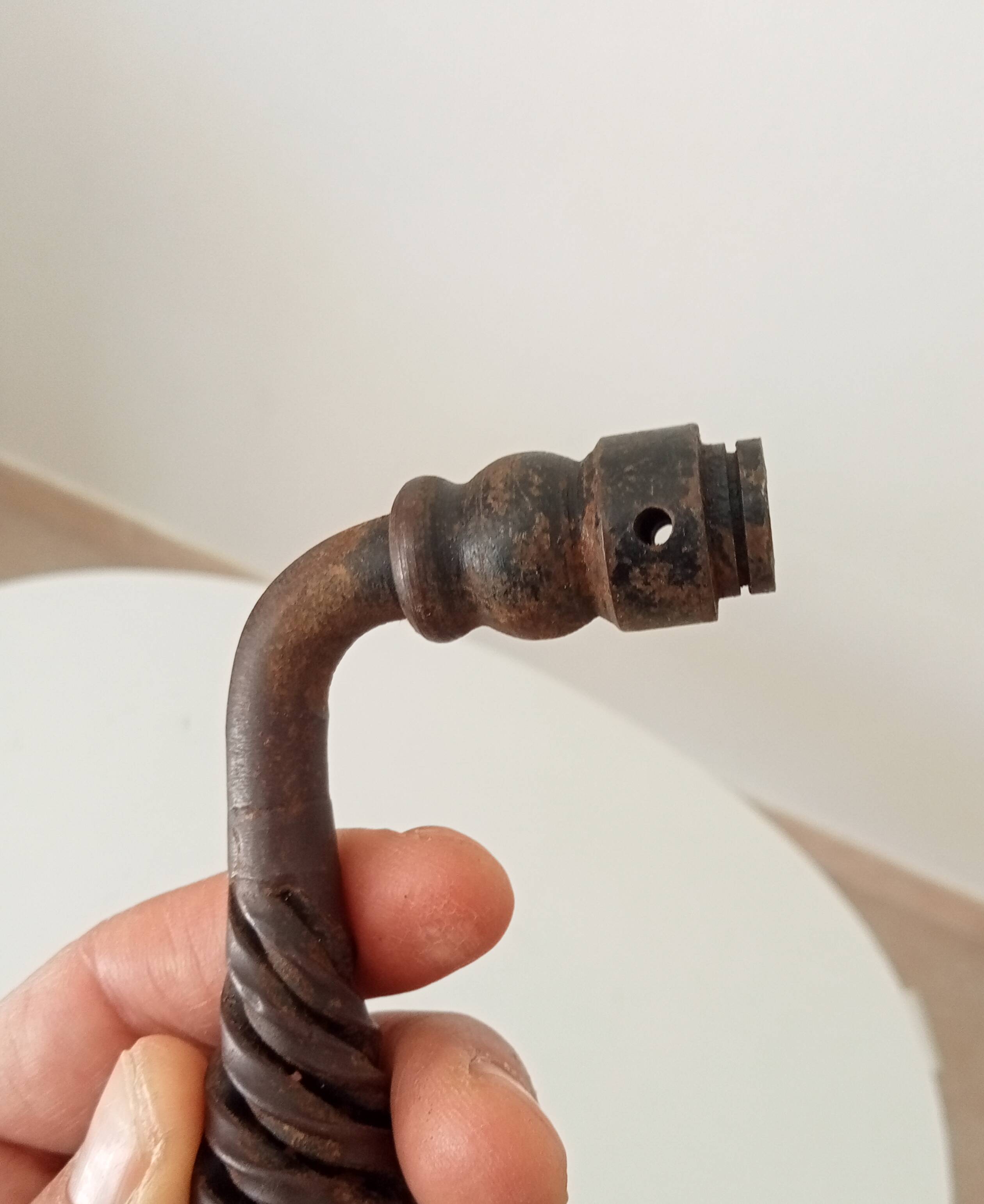 Twisted door handle in solid wrought iron, antique.