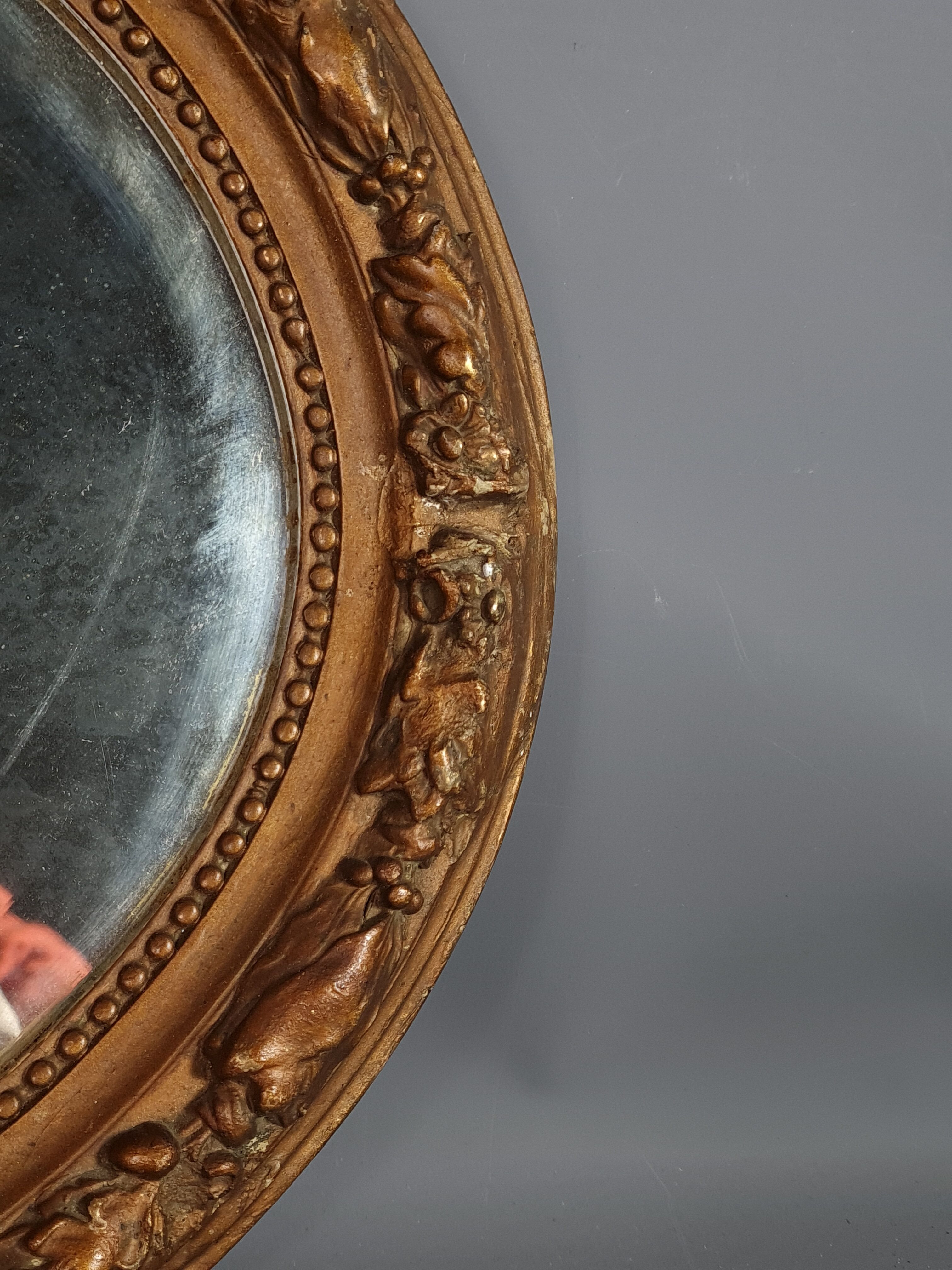 Old oval mirror beveled wooden frame & gilded stucco 50x40 cm 1900